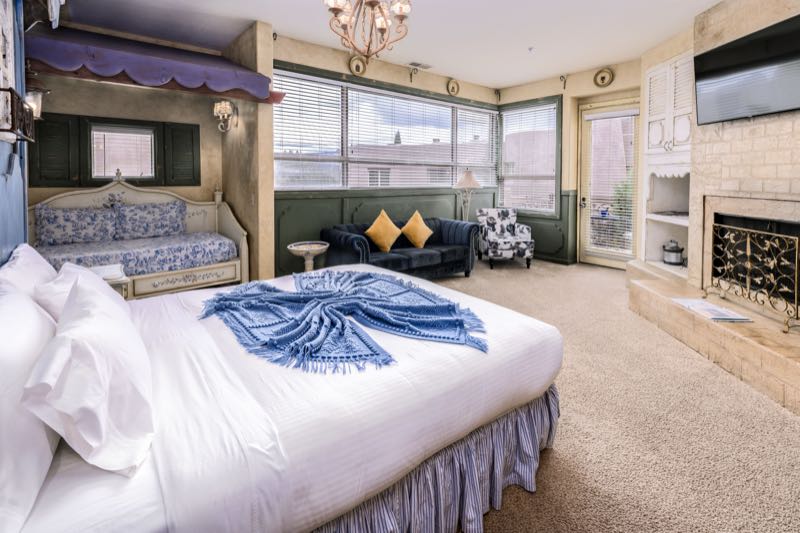 French Quarter villa bed and sitting area by large windows